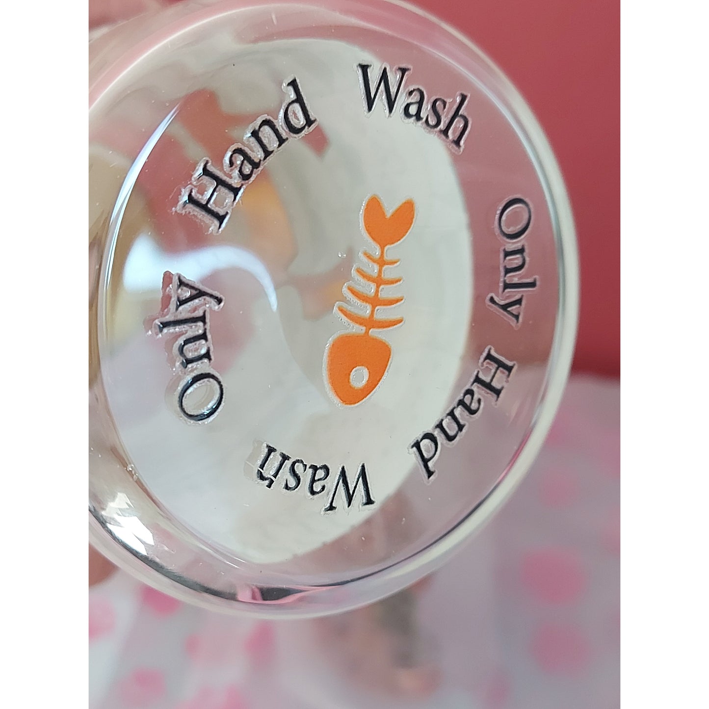 Bottom view of glass cup highlighting hand wash only instructions – ideal cat gift