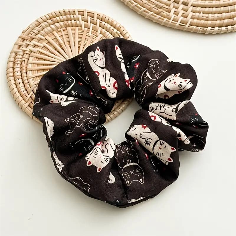 hair scrunchie with pictures of cats on it