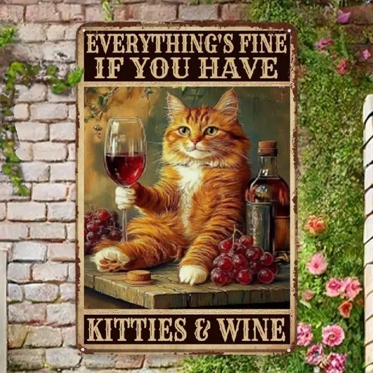 Metal vintage sign with ginger cat sat on a table holding a glass of wine. Quote says 2Everything's fine if you have kitties & wine."
